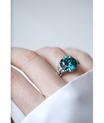 Bague Cocktail Zircon bleu et diamants sur platine les muscles