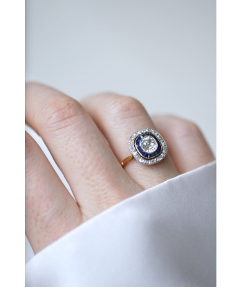 Bague Art Deco halo diamants et saphirs calibrés rembourrage situé sous