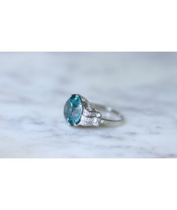 Bague Cocktail Zircon bleu et diamants sur platine les muscles