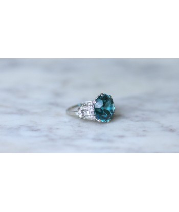 Bague Cocktail Zircon bleu et diamants sur platine les muscles