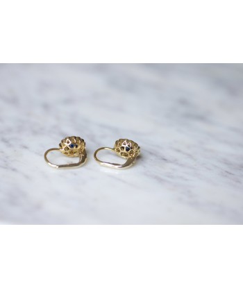 Boucles d'oreilles marguerite vintage en or jaune, saphir entourage diamants Comment ça marche