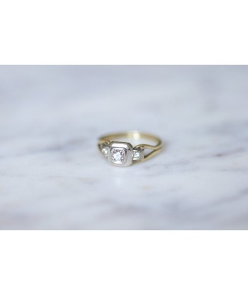 Bague solitaire vintage deux ors et diamant Véritable concentré