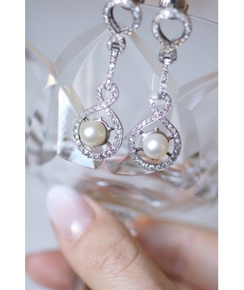 Boucles d'oreilles gouttes style Art Déco, platine, diamants, et perles Toutes les collections ici