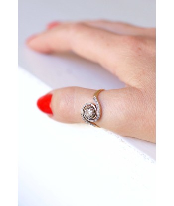 Bague Tourbillon, Belle Epoque, en or et diamants Toutes les collections ici