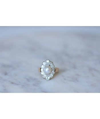 Bague marquise perle entourage diamants est présent 