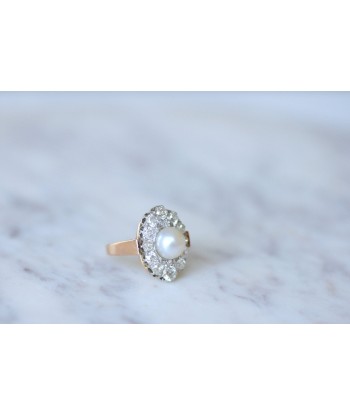 Bague marquise perle entourage diamants est présent 