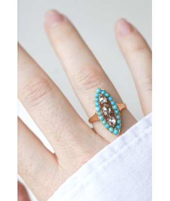 Bague marquise turquoises et diamants brillant des détails fins