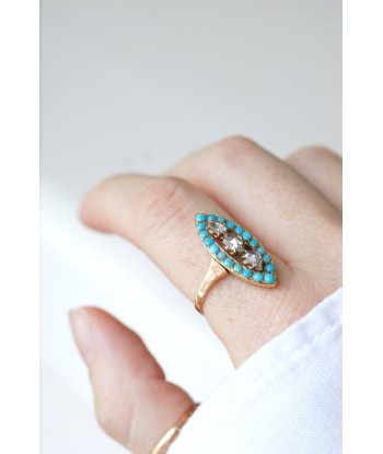 Bague marquise turquoises et diamants brillant des détails fins